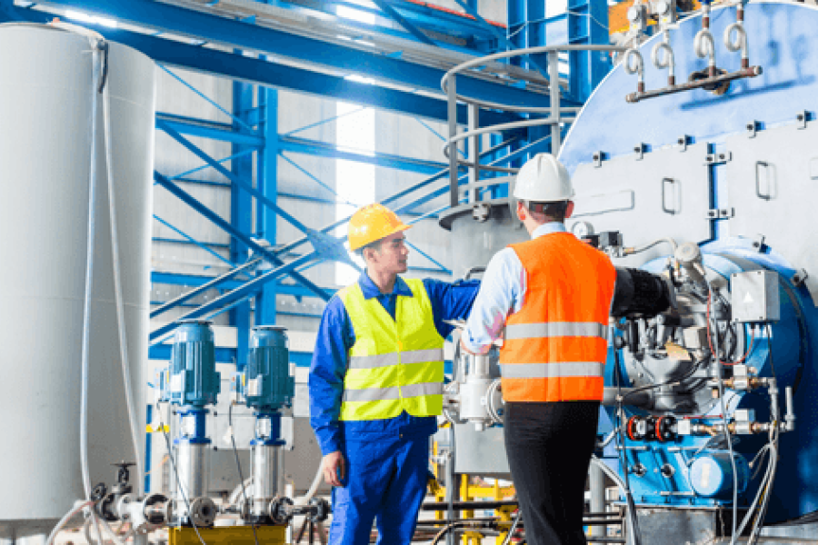 operators and inspectors inspecting an oil an gas tank