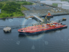 tanker arriving at oil and gas tank storage terminal